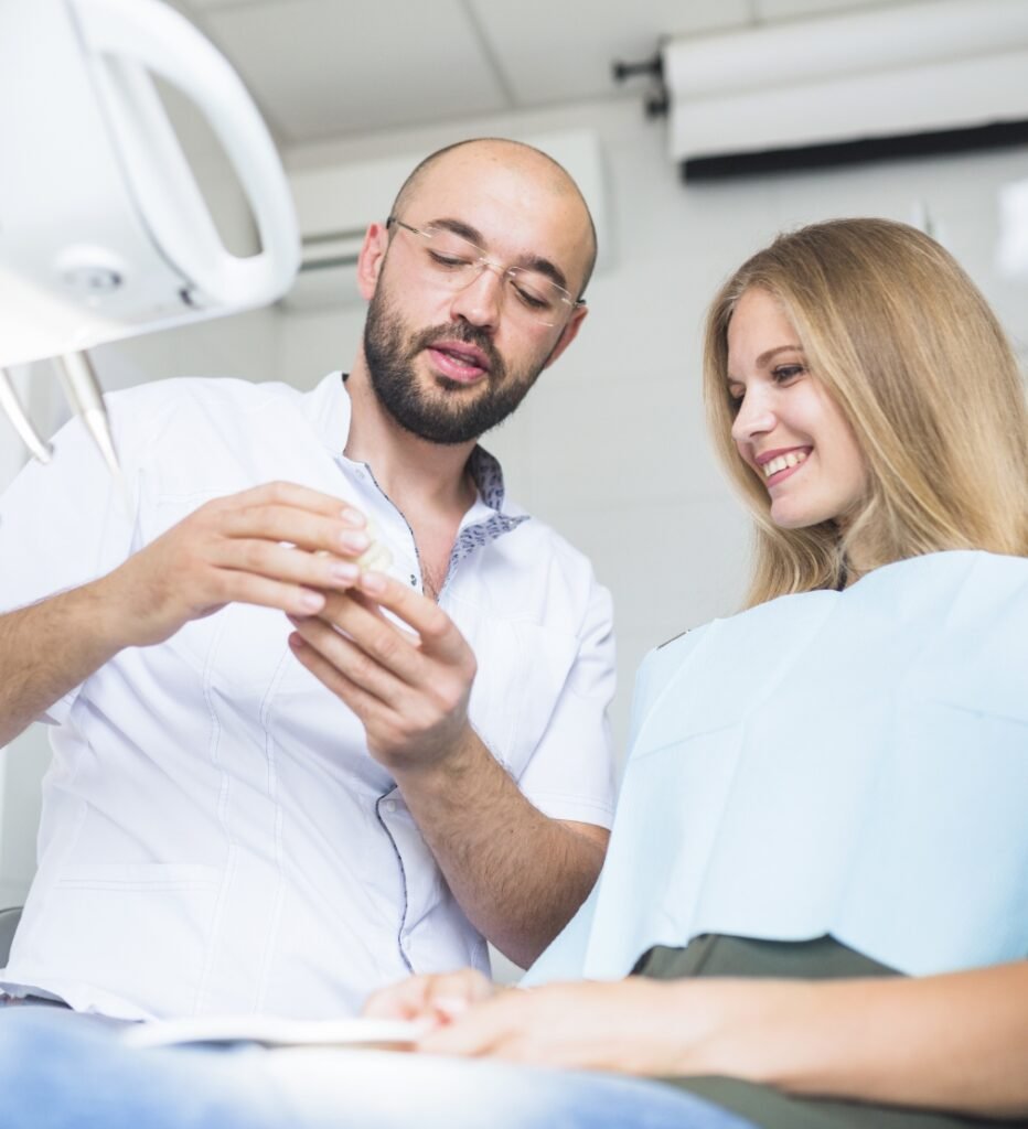 Dentist guiding to patient hawick